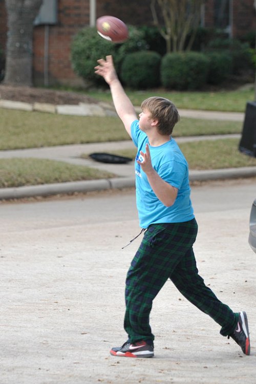 My younger son launches a throw.