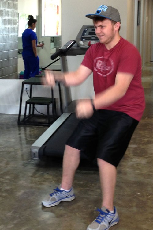 My younger son works the ropes while rehabbing his throwing shoulder.